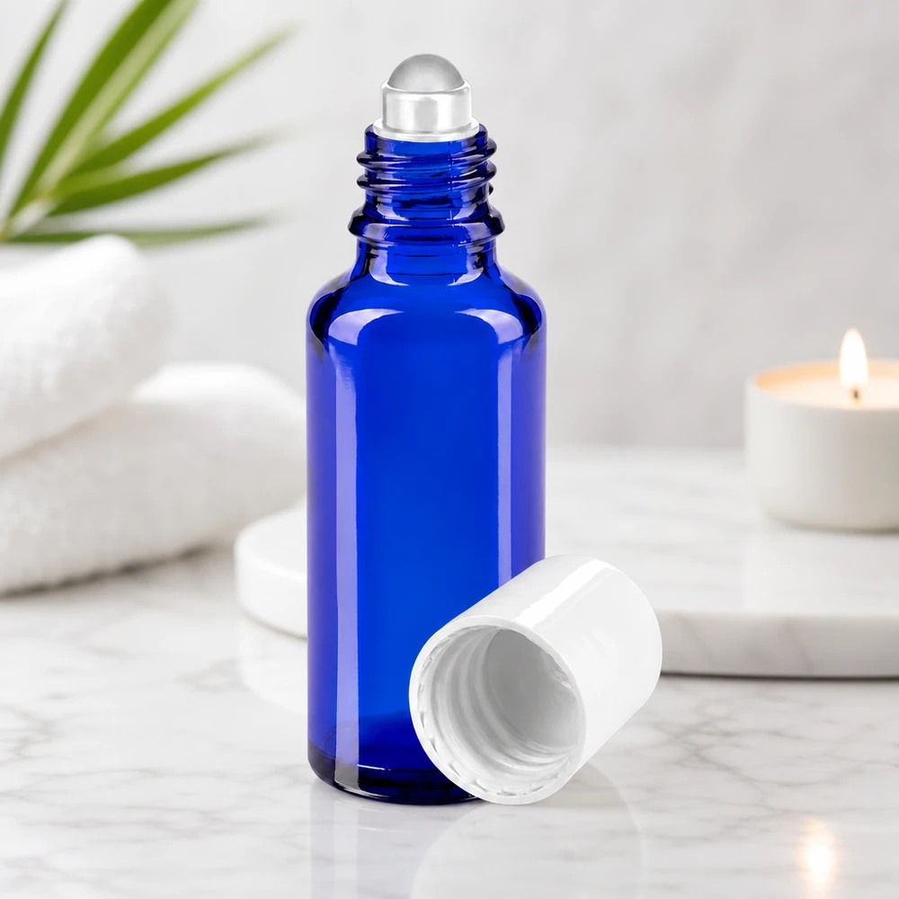 Flacone roll-on blu da 30 ml in vetro con protezione UV, con tappo standard bianco per oli essenziali